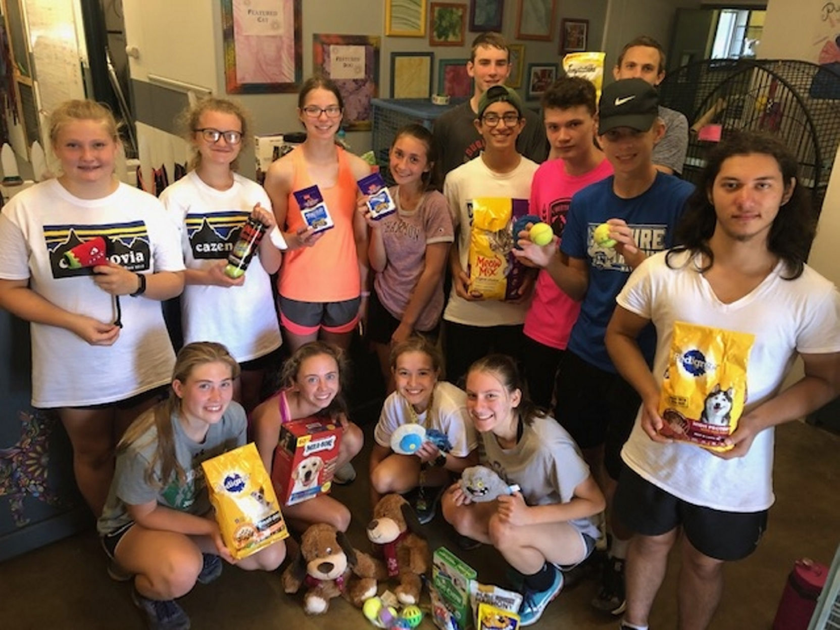Oswego cross country teams give back